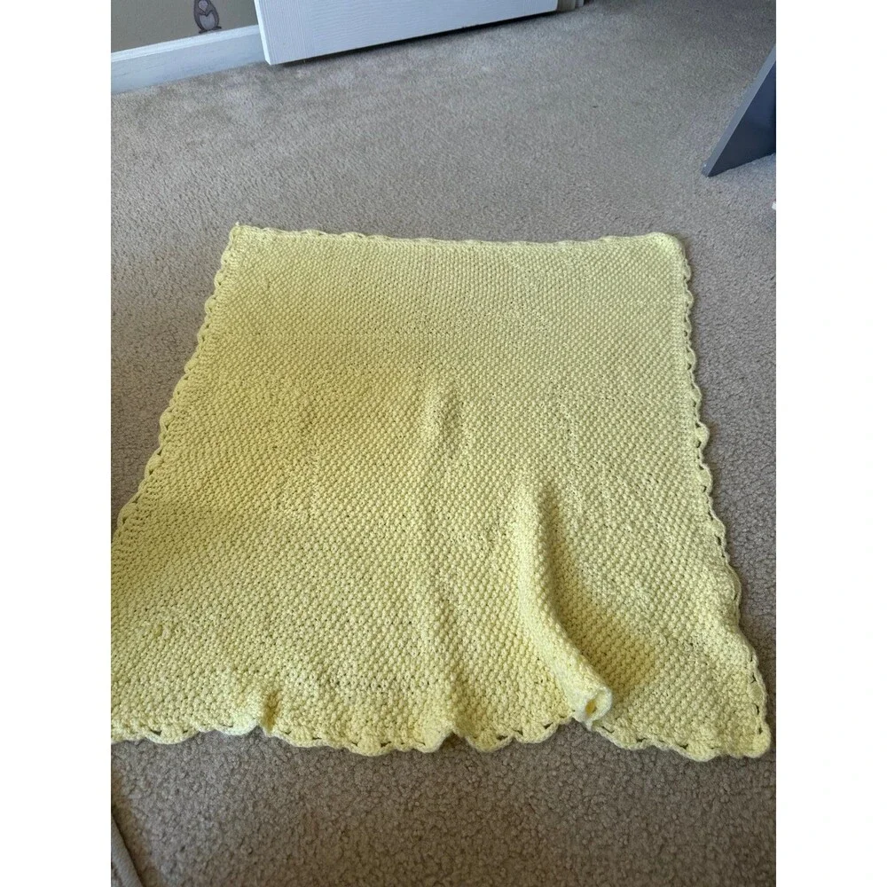 Handmade baby sweater and blankets